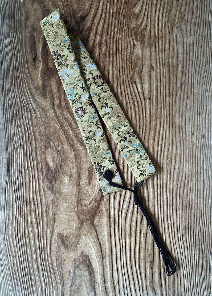 En wagesa er en slags slips i silke, som bæres af henroer på Shikoku 88